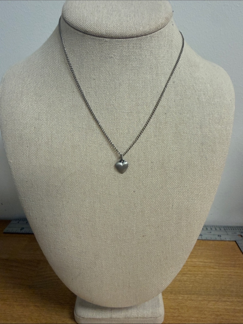 Brushed silver tone mini dainty micro heart necklace on silver tone chain